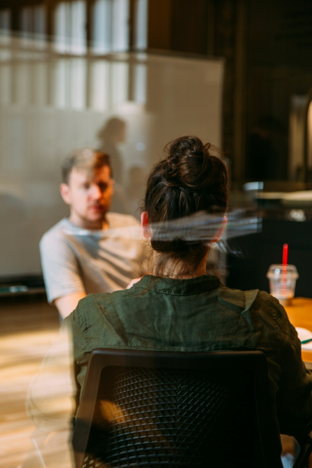 person speaking confidently in meeting